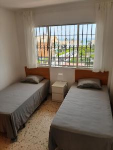 صورة لـ Doña Lupe Beach Apartment في كالا ديل مورال