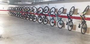 a row of bikes lined up against a wall at Gce Hoteles in Málaga
