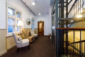 A seating area at BEIGLI Hotel & Garden