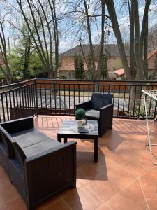 A balcony or terrace at Balaton Apartmanház