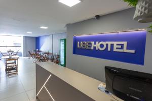 TV a/nebo společenská místnost v ubytování USEHOTEL - A uma quadra do complexo hospitalar Santa Casa