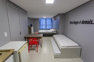 Postel nebo postele na pokoji v ubytování USEHOTEL - A uma quadra do complexo hospitalar Santa Casa