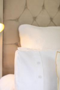 a close up of a white shirt on a bed at The Nook in West Mersea