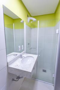 Koupelna v ubytování USEHOTEL - A uma quadra do complexo hospitalar Santa Casa + 25 fotografií