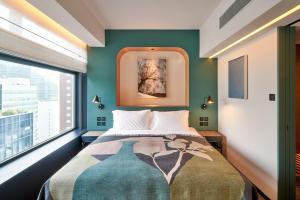 A bed or beds in a room at the Arca