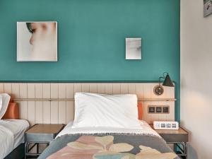 A bed or beds in a room at the Arca