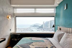 A bed or beds in a room at the Arca