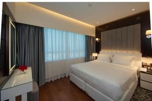 Katil atau katil-katil dalam bilik di Number One Tower Suites