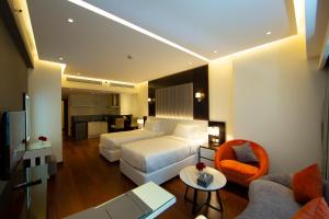 Katil atau katil-katil dalam bilik di Number One Tower Suites