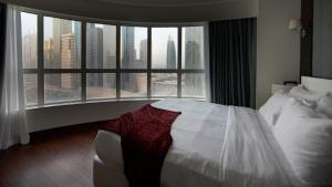 Katil atau katil-katil dalam bilik di Number One Tower Suites