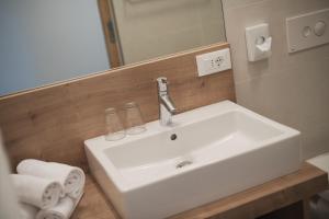 Koupelna v ubytování Apparthotel Zunneler