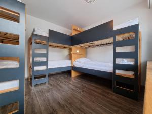 Postel nebo postele na pokoji v ubytování Hostel by Hyve Basel