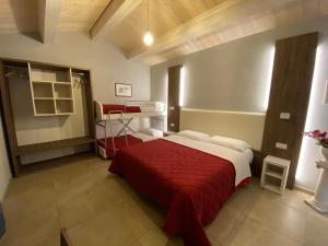 Una cama o camas en una habitación de Il Villino Agriturismo B&B
