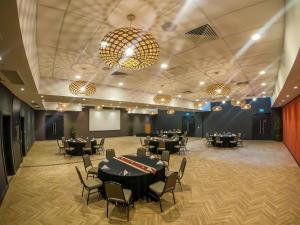 Veitingastaður eða matsölustaður á Highlander Hotel