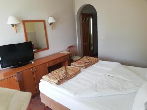 מיטה או מיטות בחדר ב-Hotel Makpetrol Struga