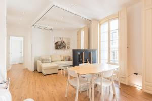 A seating area at Urbe10 Plaza de la Constitucion 1 Bedroom Apartment