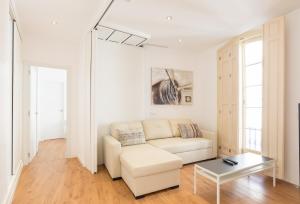 A seating area at Urbe10 Plaza de la Constitucion 1 Bedroom Apartment