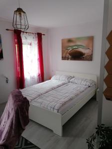a bedroom with a bed in a room at Apartma Metija LUX z savno in Kobarid