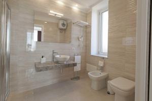 Koupelna v ubytování Esseneto Rooms