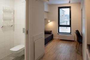 Kúpeľňa v ubytovaní TPS Apartamenty Olimpijskie