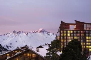 a hotel with a view of a mountain at Belambra Clubs Arc 2000 - L'Aiguille Rouge - Ski pass included in Arc 2000