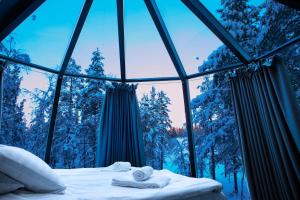 Ένα ή περισσότερα κρεβάτια σε δωμάτιο στο Lapland Hotels Riekonlinna