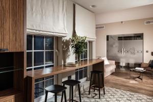 Posezení v ubytování 1926 Le Parisot Boutique Suites