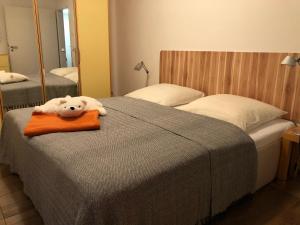Postel nebo postele na pokoji v ubytování Angekommen