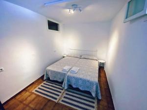 Postel nebo postele na pokoji v ubytování Casa Aire de Mar