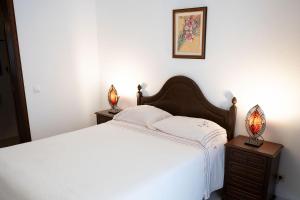 Postel nebo postele na pokoji v ubytování Guesthouse A Lareira
