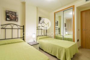 Postel nebo postele na pokoji v ubytování Vila Dorpesa X-CM + 22 fotografií