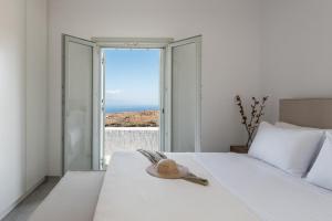 A bed or beds in a room at Nevermind Vacations villa A