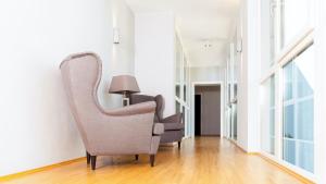 Istumisnurk majutusasutuses Pfeiler's Bürgerstüberl - Hotel
