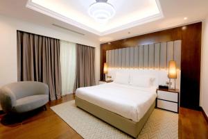 Katil atau katil-katil dalam bilik di Number One Tower Suites