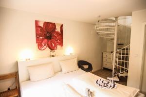 Ein Bett oder Betten in einem Zimmer der Unterkunft Anne