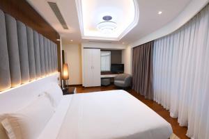 Katil atau katil-katil dalam bilik di Number One Tower Suites