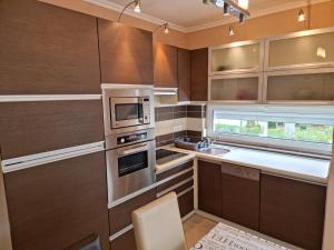 Kuchyňa alebo kuchynka v ubytovaní Betti Apartman