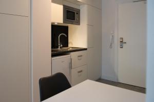 Kuchyňa alebo kuchynka v ubytovaní TPS Apartamenty Olimpijskie