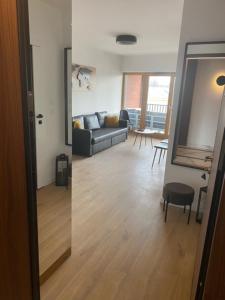 Posedenie v ubytovaní APARTAMENT NAD MOTŁAWĄ Z WIDOKIEM