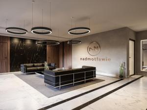 Posedenie v ubytovaní APARTAMENT NAD MOTŁAWĄ Z WIDOKIEM