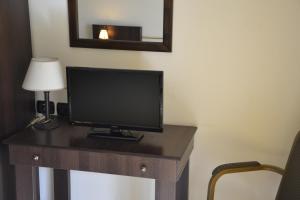 TV a/nebo společenská místnost v ubytování Hotel Marabel