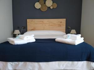 מיטה או מיטות בחדר ב-Greta Etxea