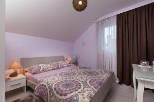 Posteľ alebo postele v izbe v ubytovaní Cetinic Apartment + 11 fotografií