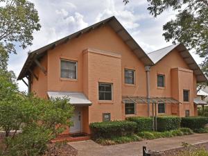 a house with a gambrel roof at Villa 3br Tempranillo Villa located within Cypress Lakes Resort in Pokolbin