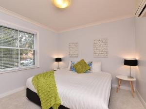 A bed or beds in a room at Villa 3br Penivity located within Cypress Lakes Resort