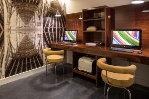 TV a/nebo společenská místnost v ubytování Hotel Hugo