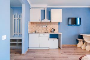 Η κουζίνα ή μικρή κουζίνα στο Rest Time Apartments +61 φωτογραφίες