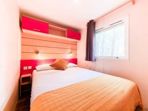 Voodi või voodid majutusasutuse Bungalow Maite toas