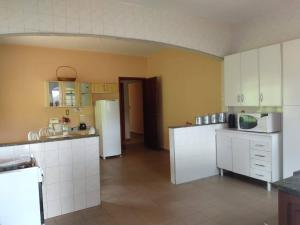 Kjøkken eller kjøkkenkrok på Chácara recanto da família