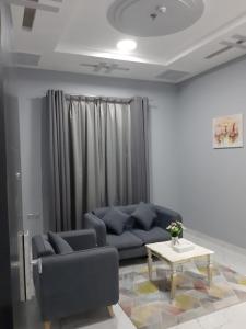 Area soggiorno di Paris Furnished Apartments - Tabasum Group